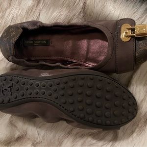 Never worn.  Great condition. Louis Vuitton flats.